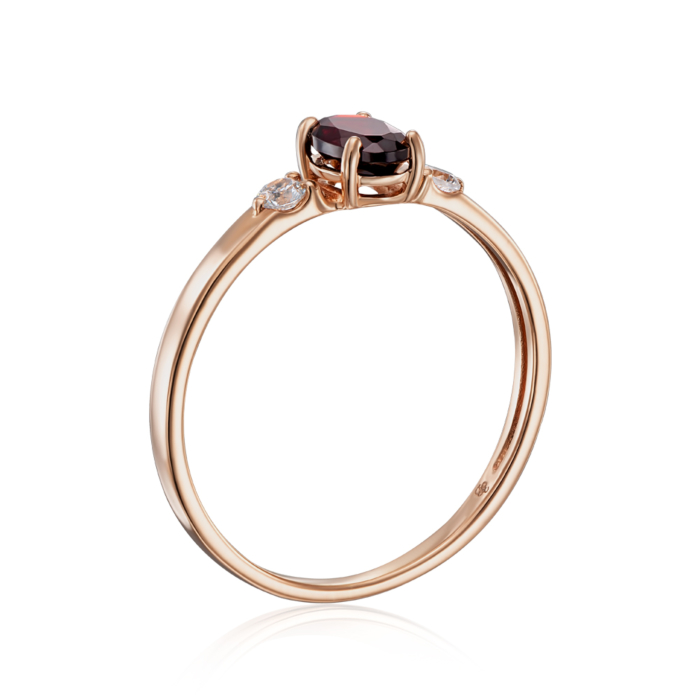 Золота каблучка з гранатом і фіанітами. Артикул 530177/гр
