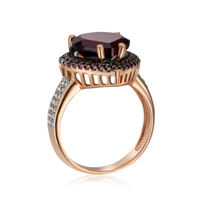 Золота каблучка з гранатом і фіанітами. Артикул 530189/гр